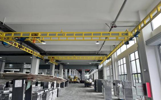 KBK light crane system for paper mill workstation handling