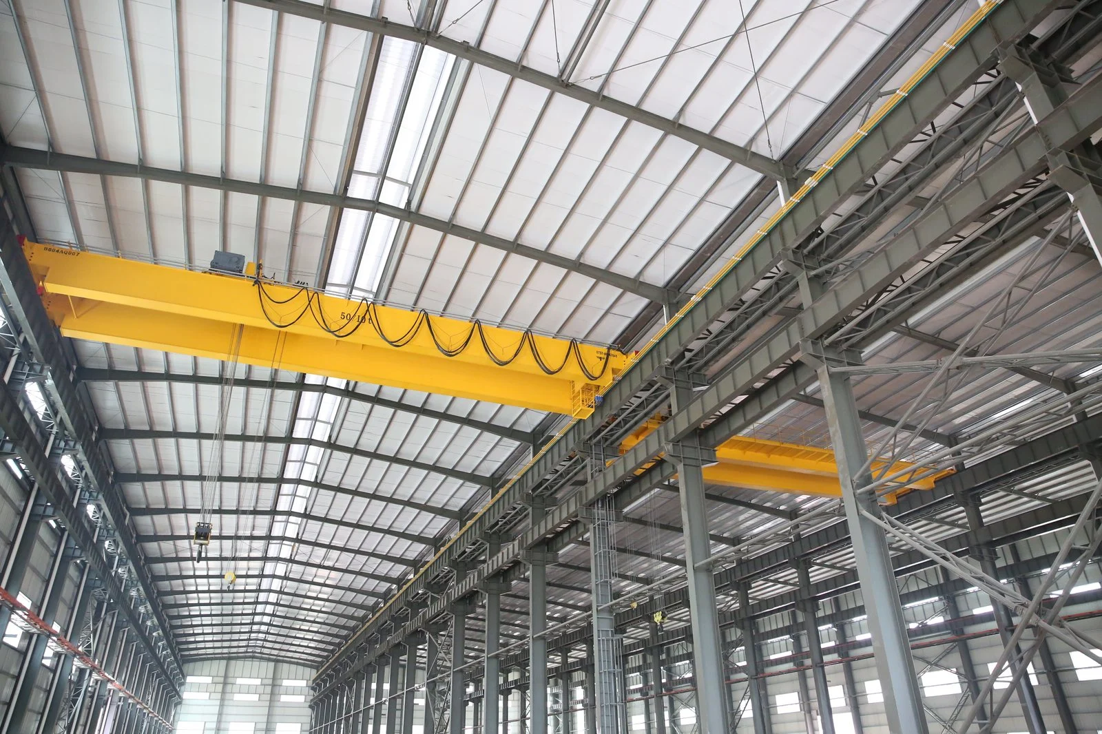 Overhead crane runway and workshop bay for mining equipment production
